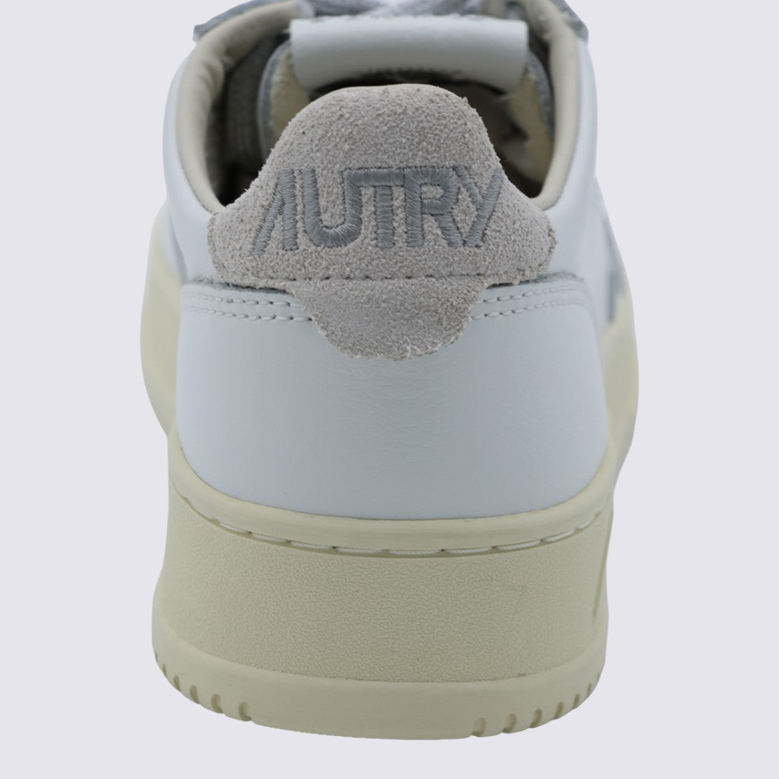 Autry Minimalist White Leather Sneakers With Perforated Detailing