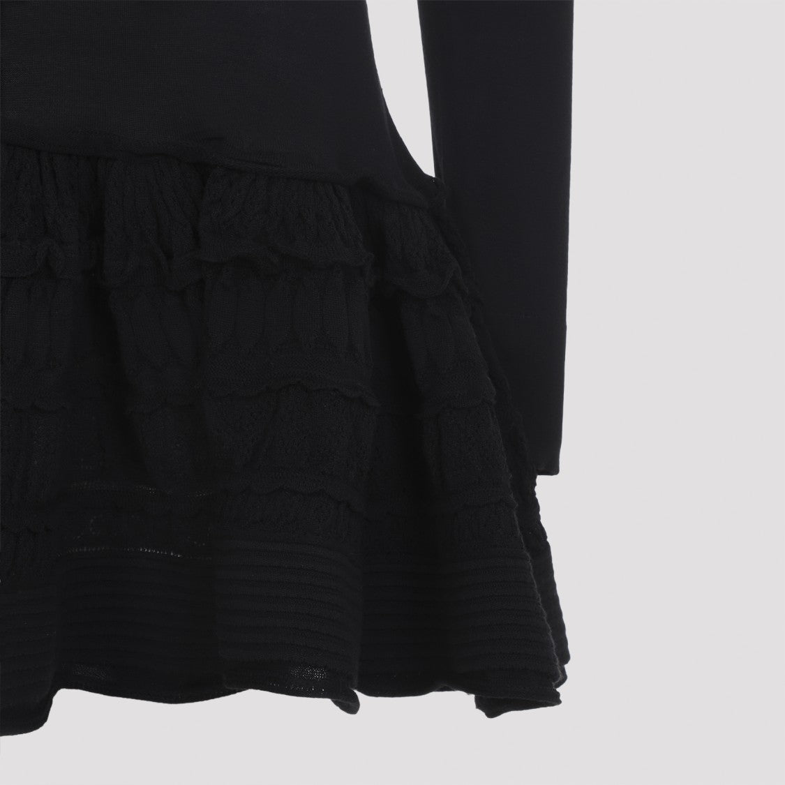 Alaïa Fitted Black Wool Dress With Ruffled Skirt