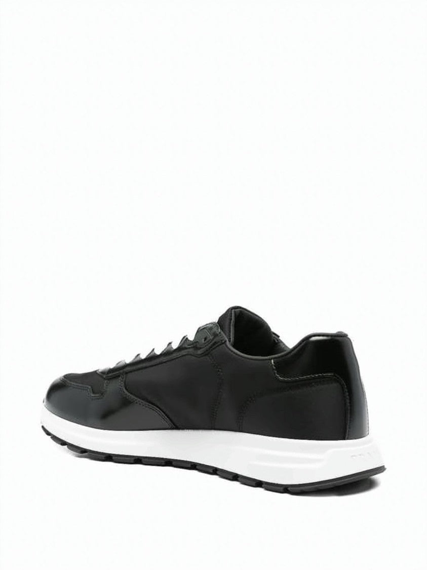 Prada Low-Top Cowhide Leather And Nylon Sneakers With Signature Logo