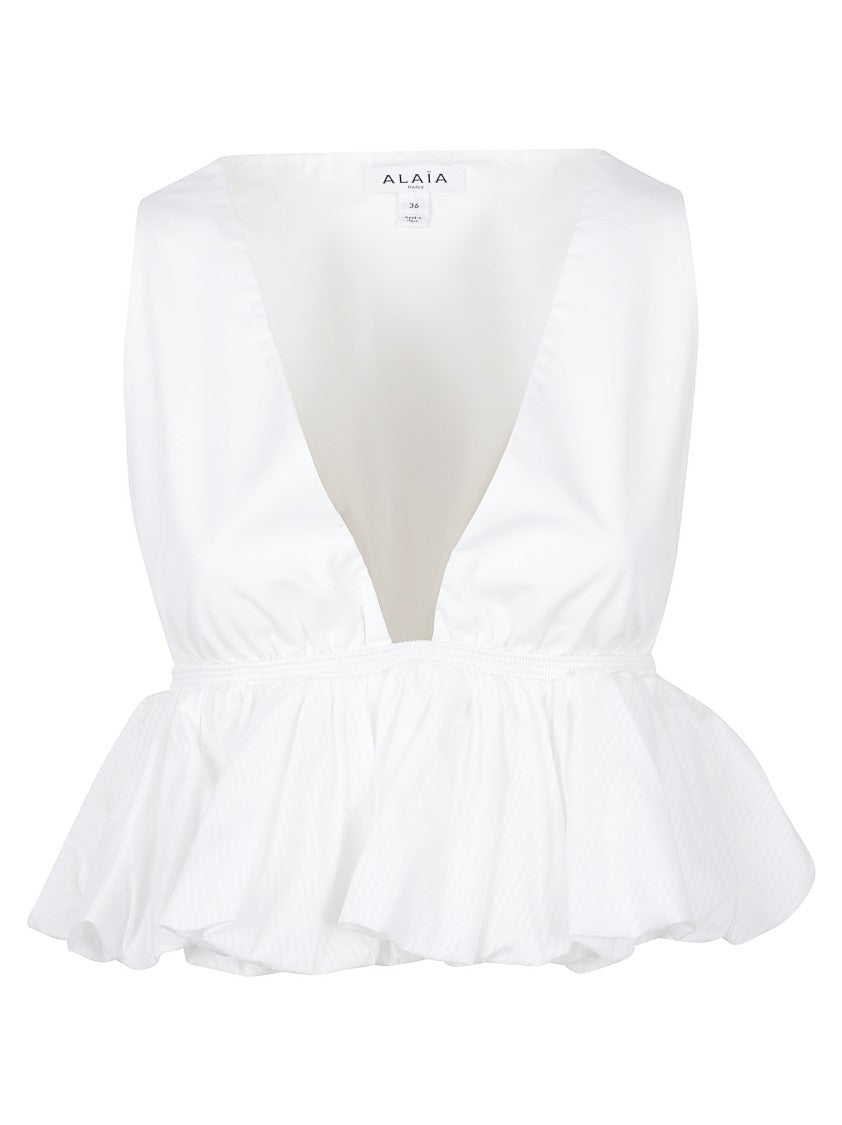 Alaïa Cropped Peplum Top With Deep V-Neck And Ruffled Hem