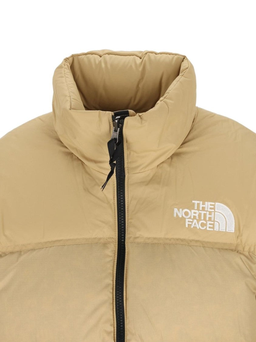 The North Face Boxy Silhouette Puffer Jacket With High Collar And Zip Pockets