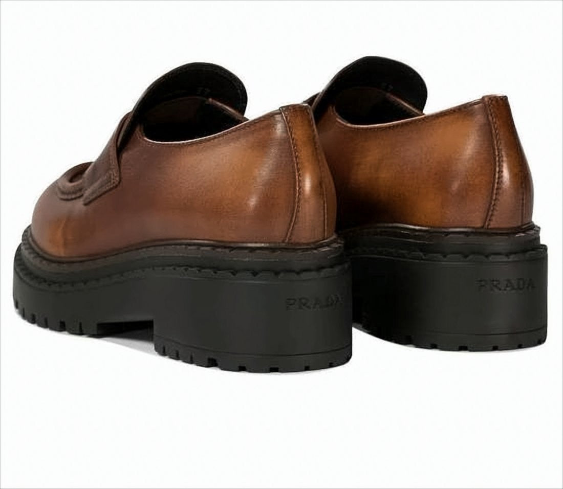 Prada Polished Brown Calf Leather Loafers With Triangular Logo Plaque