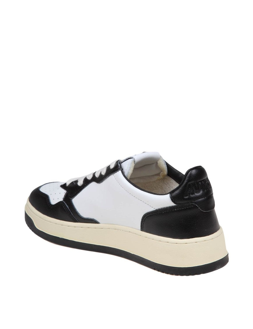 Autry Sneakers In Black And White Leather