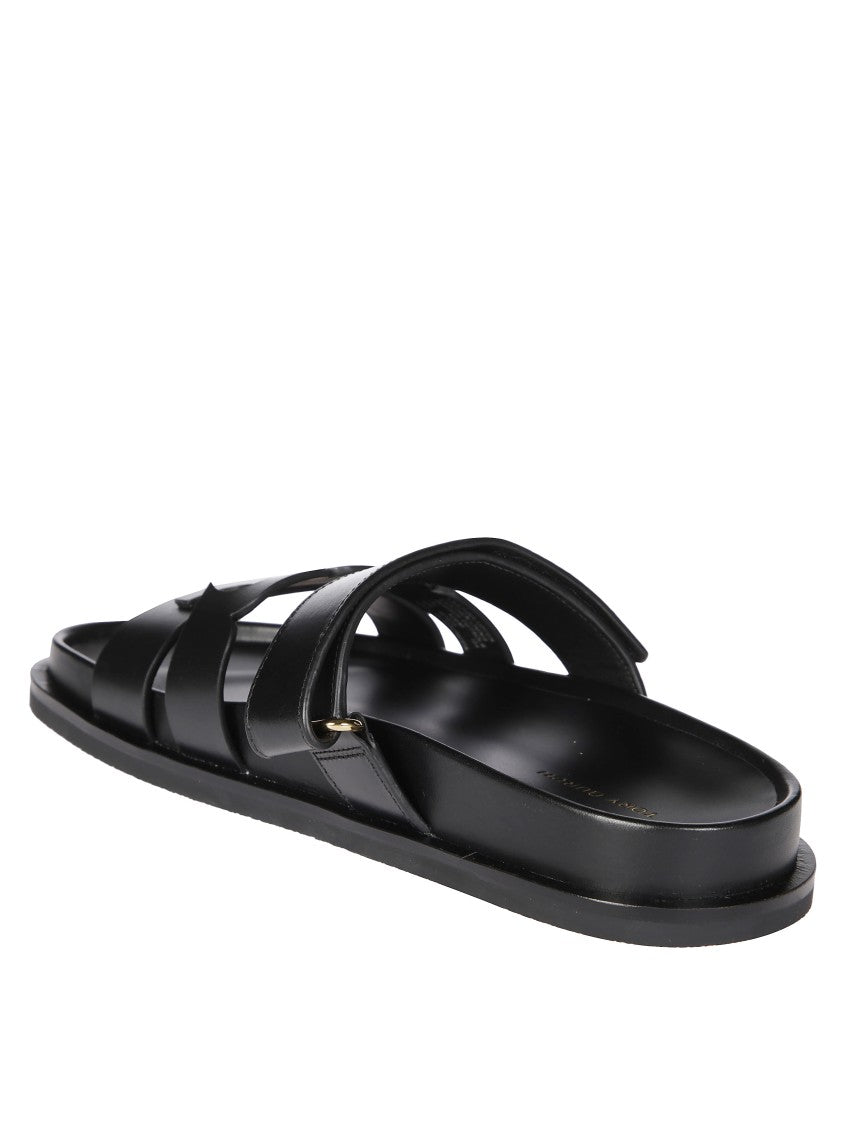 Tory Burch Black Slide Sandals With Prominent Logo Embellishment