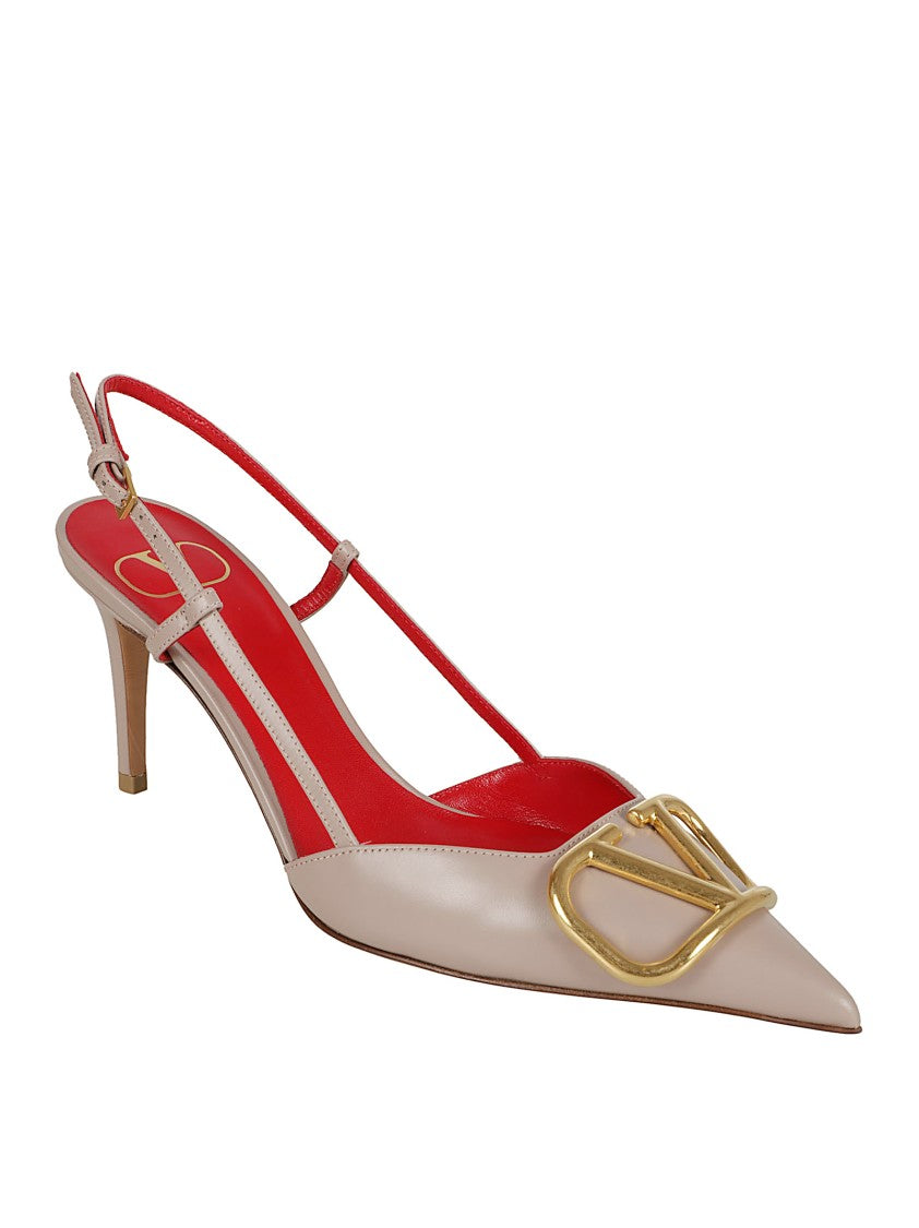 Valentino Garavani Pointed-Toe Calfskin Pumps With Gold-Tone Vlogo Plaque