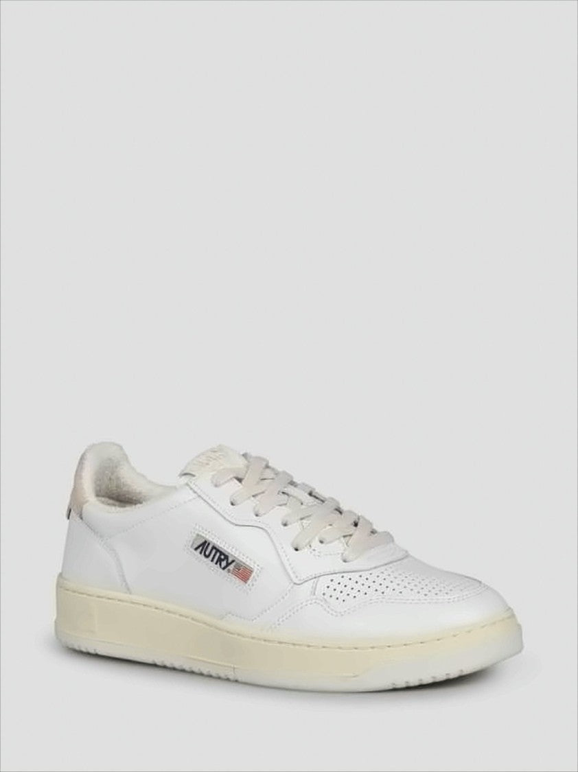 Autry Low-Top Leather Sneakers With Perforated Toe Box