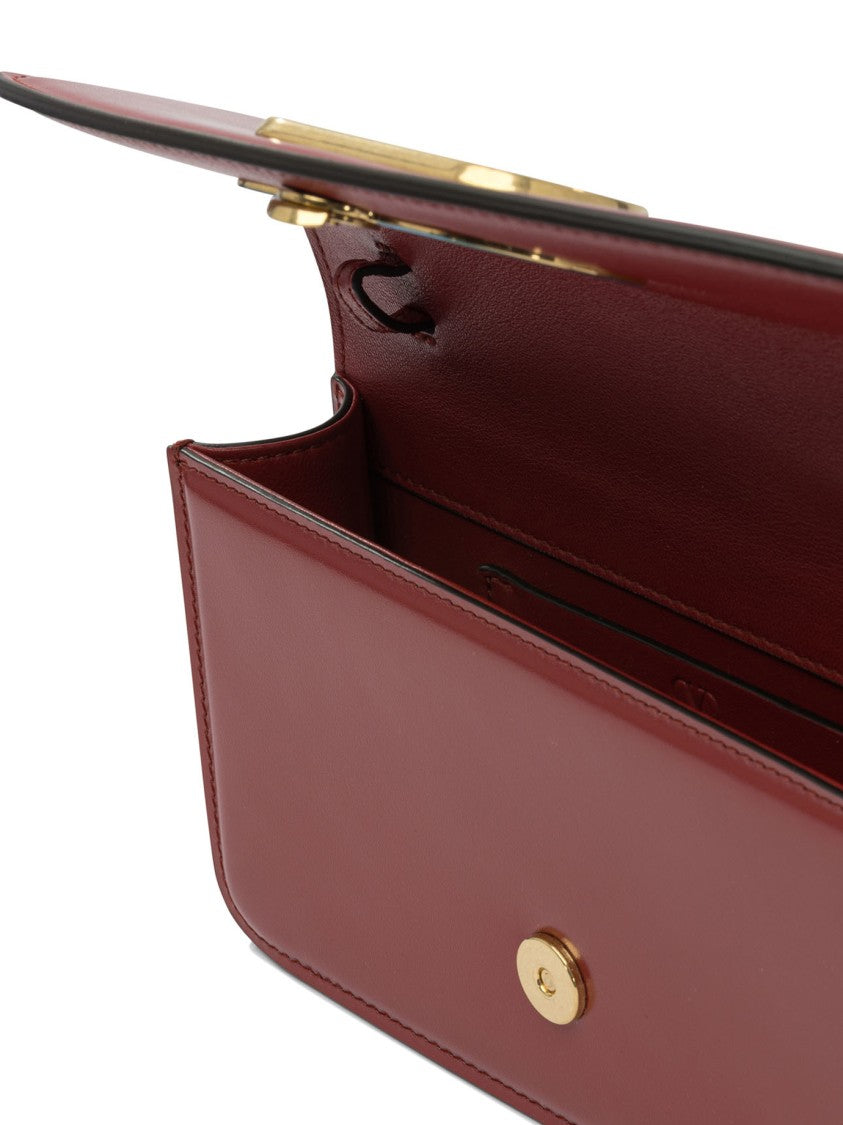 Valentino Garavani "Vain" Clutch