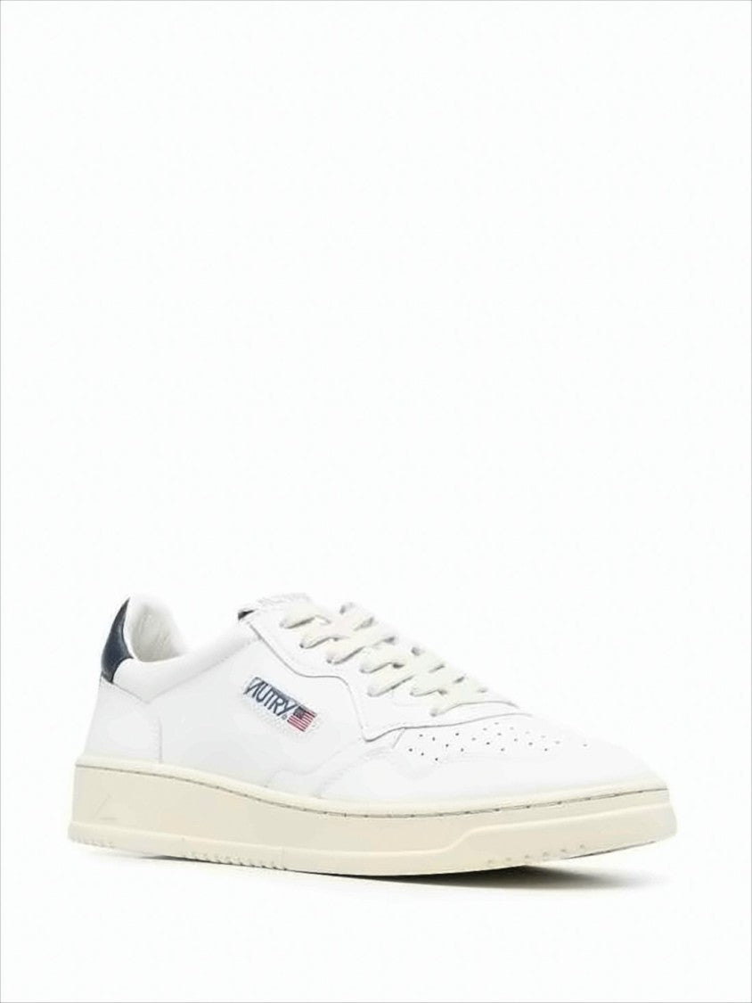 Autry Minimalist Low-Top Sneakers With Perforated Detailing