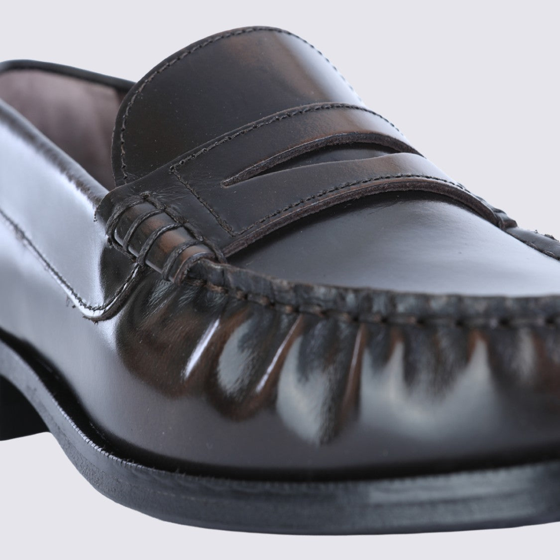 Alohas Timeless Black Leather Penny Loafers With Moccasin Stitching