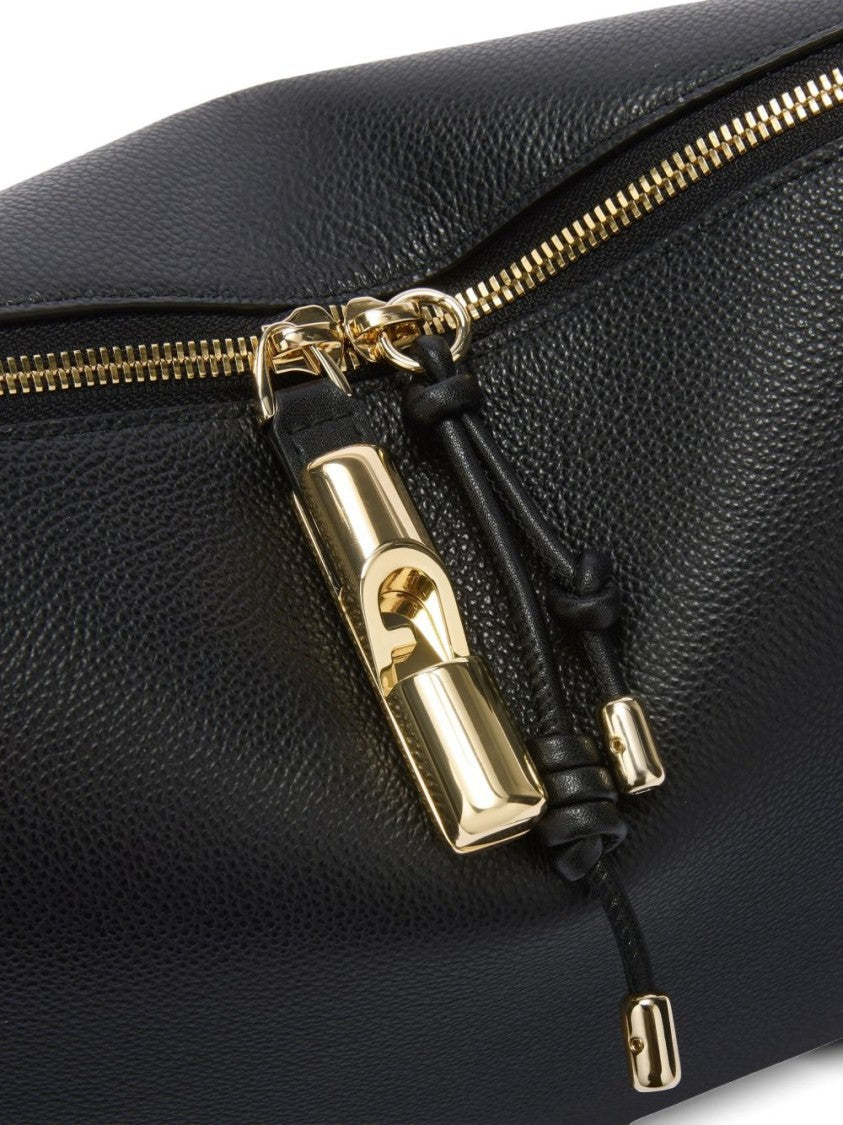 Furla Elongated Leather Handbag With Adjustable Strap And Gold Accents