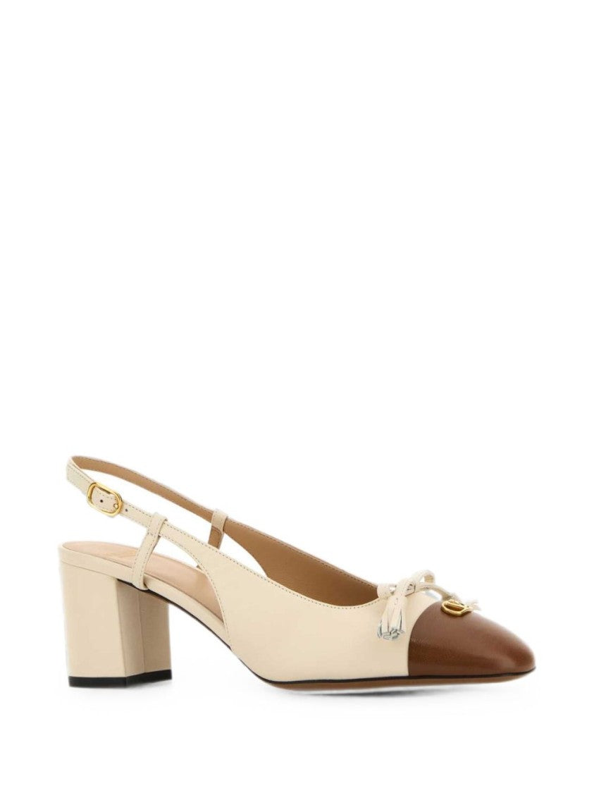 Valentino Garavani Pointed Toe Flat Shoes With Slingback Strap And Decorative Emblems