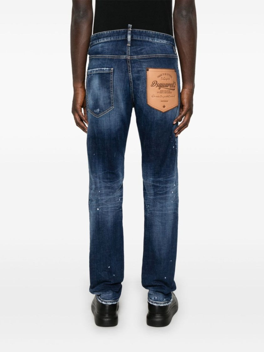 Dsquared2 Slim Fit Distressed Blue Denim Jeans With Paint Splatters