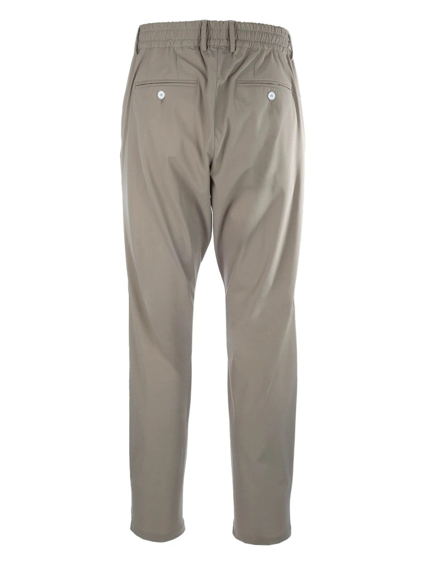 Cruna Muted Beige Relaxed Fit Tapered Trousers