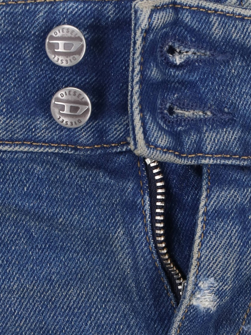 Diesel Flared Blue Wash Jeans With Vintage Distressing