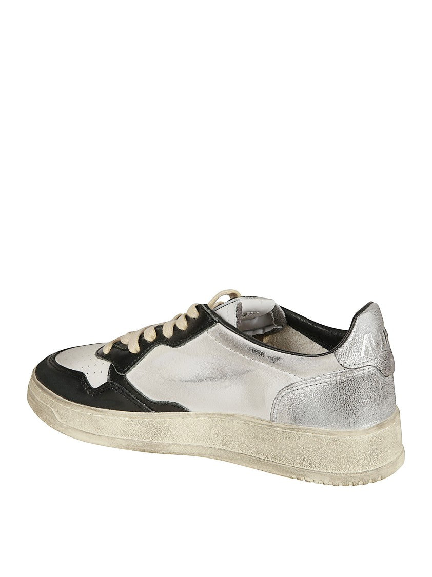 Autry Low-Top Sneakers In Crackled Leather With Handcrafted Worn Effect