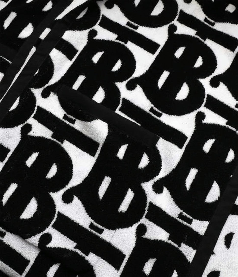 Burberry Graphic Patterned Cape With Hood And Trim