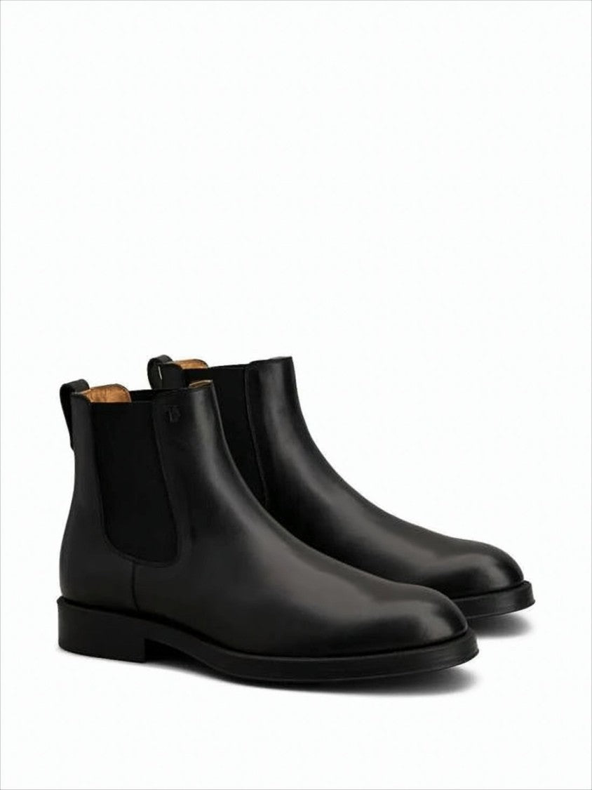 Tod's Black Leather Ankle Boots With Elastic Side Panels And Textured Sole
