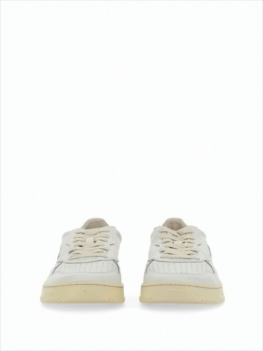 Autry Low-Top Sneakers With Perforated Detailing And Vintage Aesthetics