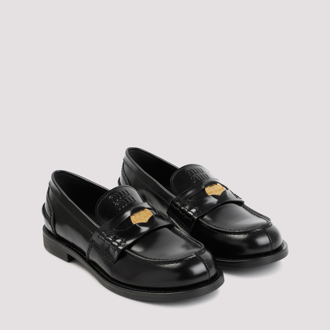 Miu Miu Black Calf Leather Loafers With Metal Plaque Detail