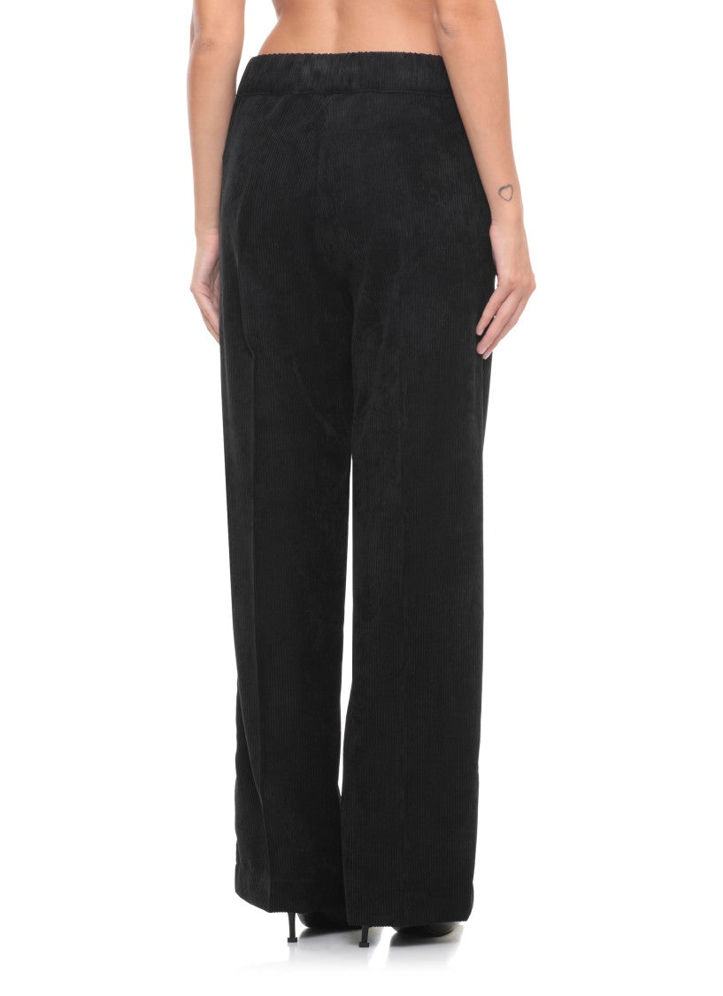 D. Exterior Black Corduroy Pants