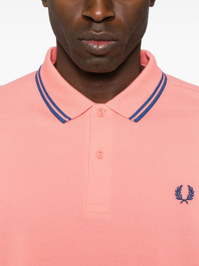 Comme Des Garçons Coral Pink Polo Shirt With Slogan Print