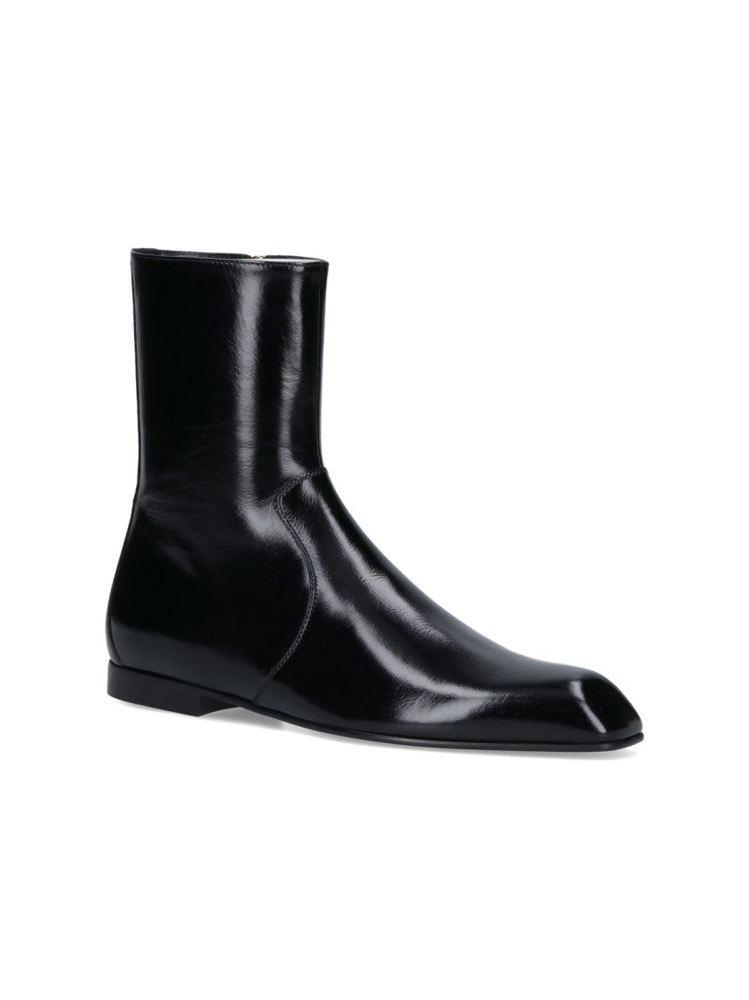 Khaite Sophisticated Black Calf Leather Ankle Boot With Gold Hardware