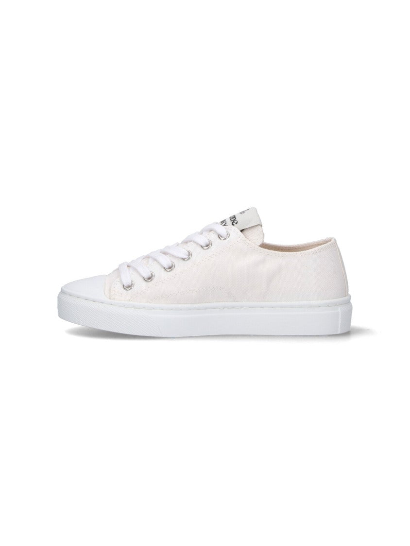 Vivienne Westwood Minimalist White Sneakers With Smooth Silhouette