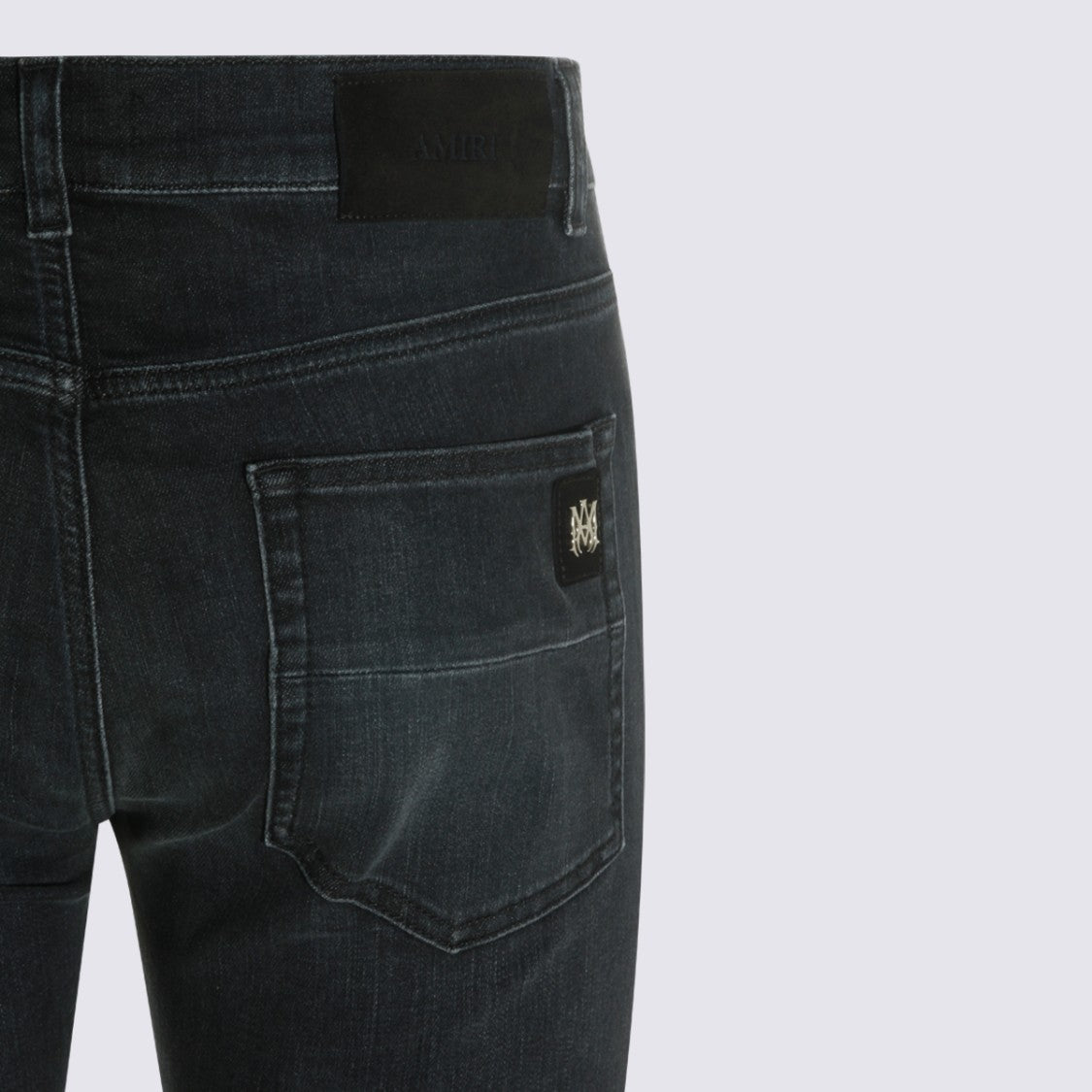 Amiri Dark Wash Slim-Fit Jeans With Distressed Knees And Embroidered Details