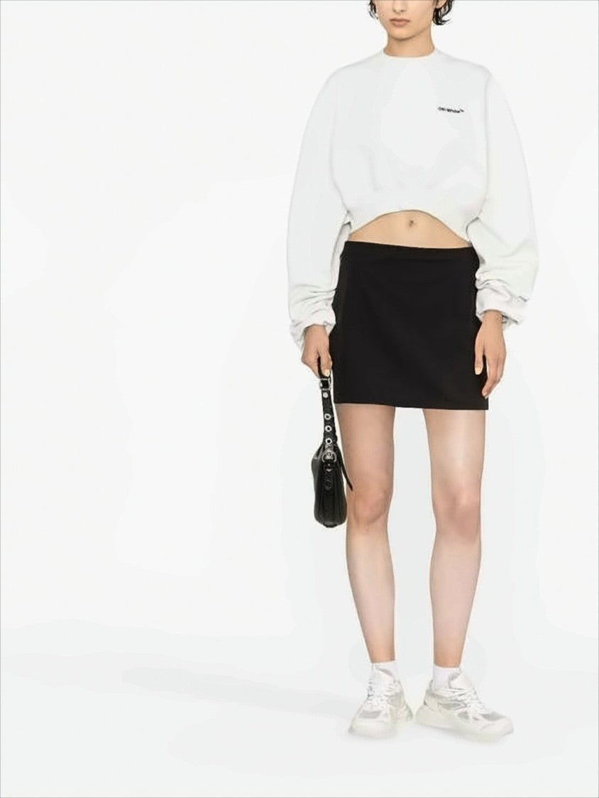 Off-White Cropped Long-Sleeve Top With Relaxed Fit And Subtle Logo