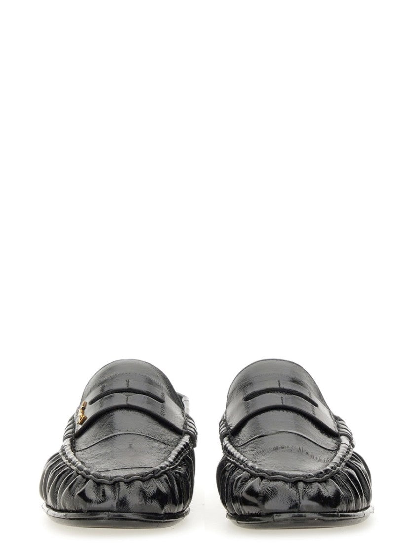 Saint Laurent Moccasin-Style Black Leather Loafers With Gold Accents
