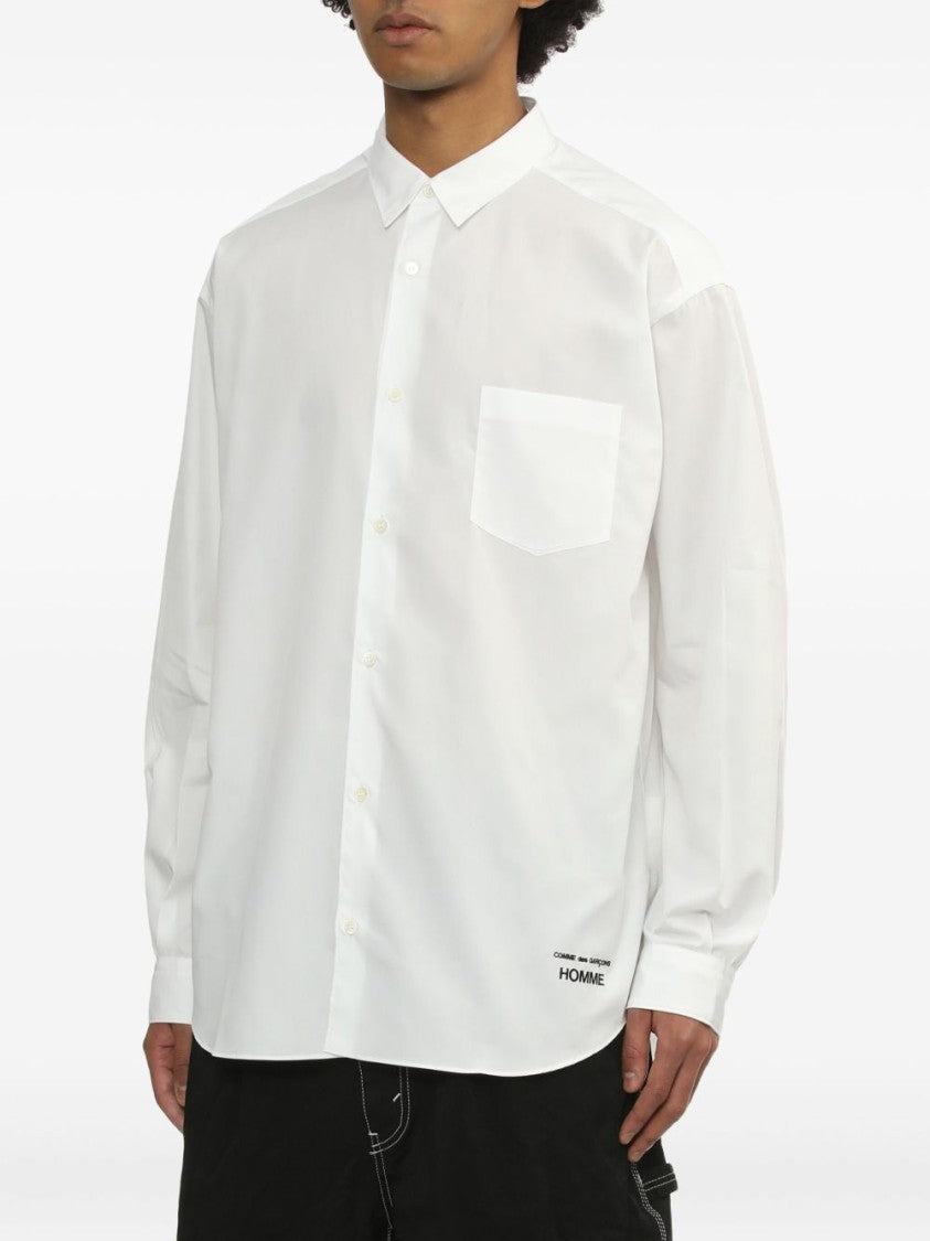 Comme Des Garçons Long-Sleeved White Shirt With Classic Button Design And Pleat Detailing
