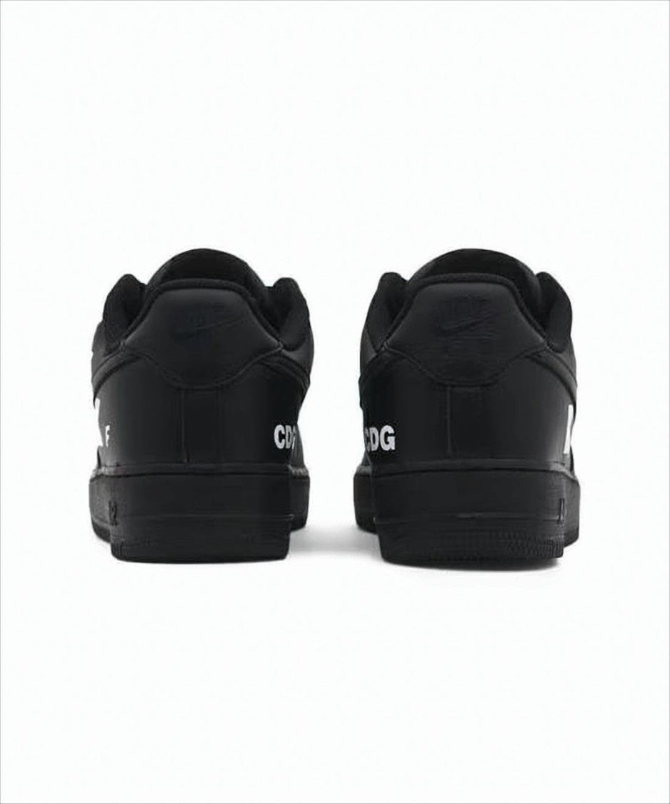 Comme Des Garçons Perforated Black Leather Sneakers With Graphic Detailing