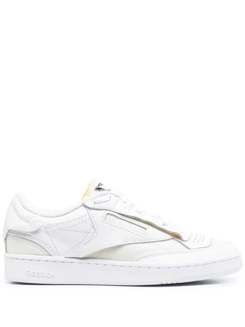 Maison Margiela Minimalist White Leather Low-Top Sneakers With Perforated Detailing