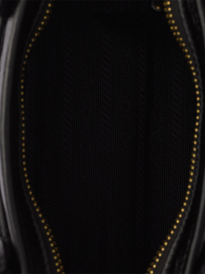 Prada Mini Handbag With Glossy Black Finish And Gold Accents