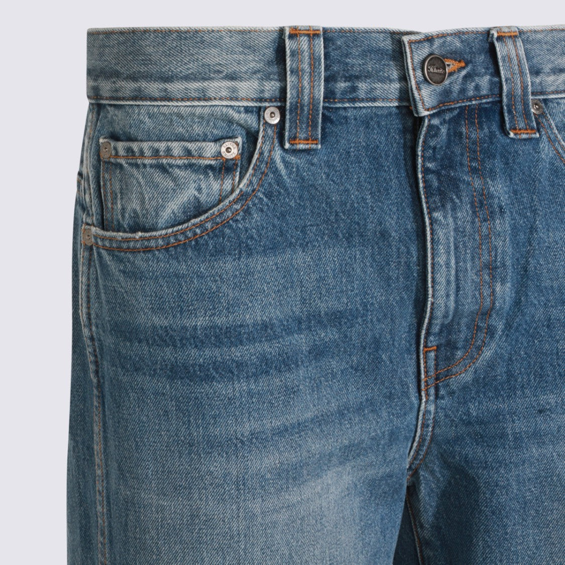 Khaite Mid-Blue Straight-Leg Jeans With Subtle Fading And Distressed Hems