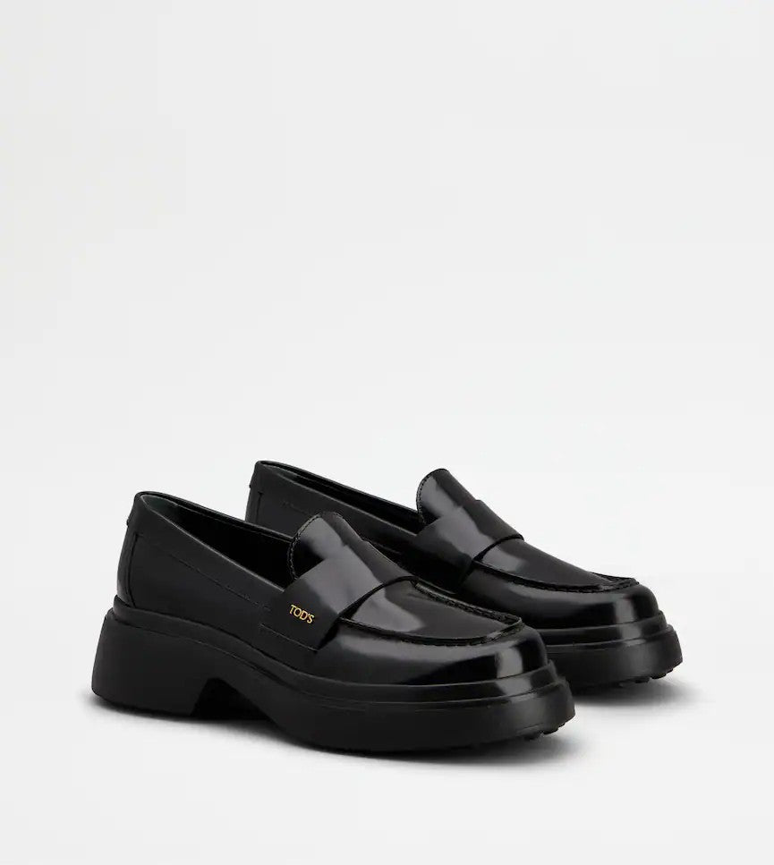 Tod's Timeless Black Calfskin Loafers With Textured Sole
