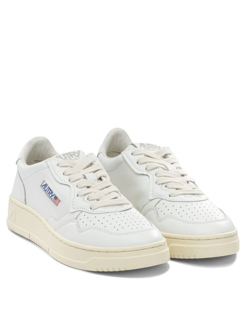 Autry Minimalist Low-Top Sneakers With Perforated Detailing
