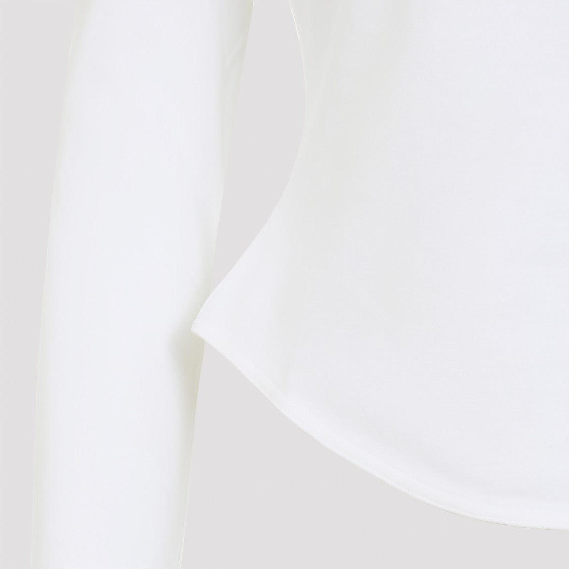 Alaïa Fitted Long-Sleeve Top With Curved Hemline