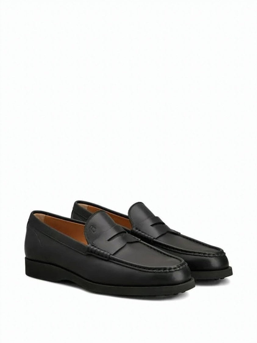Tod's Black Leather Loafer With Classic Penny Strap And Rubber Pebbled Sole