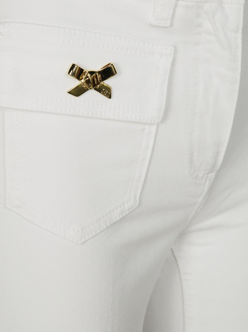 Elisabetta Franchi Flared White Pants With Gold Bow Embellishments