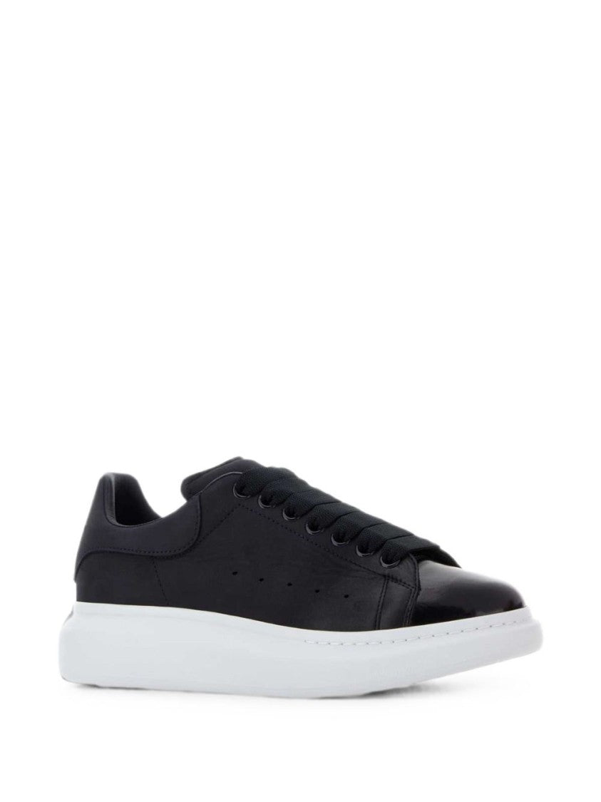 Alexander Mcqueen Black Sleek Leather Modern Sneakers