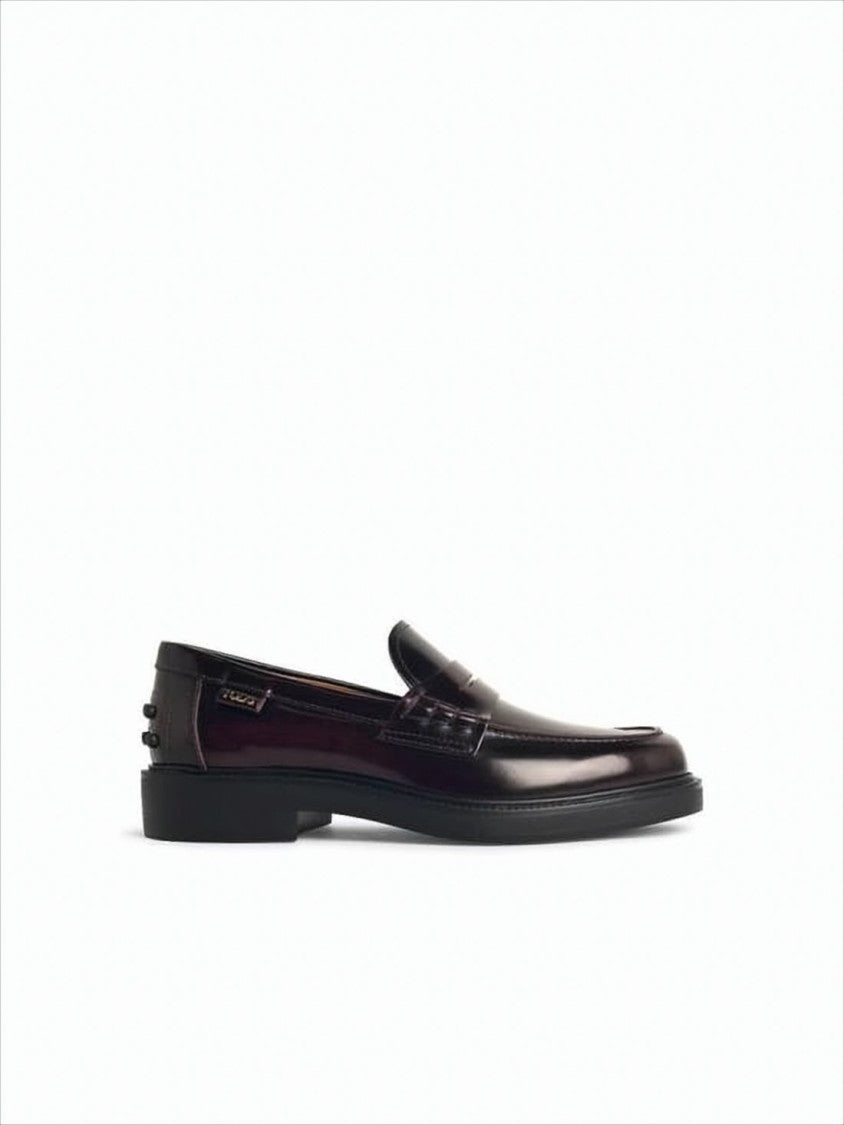 Tod's Polished Burgundy Loafer With Signature Pebbled Sole