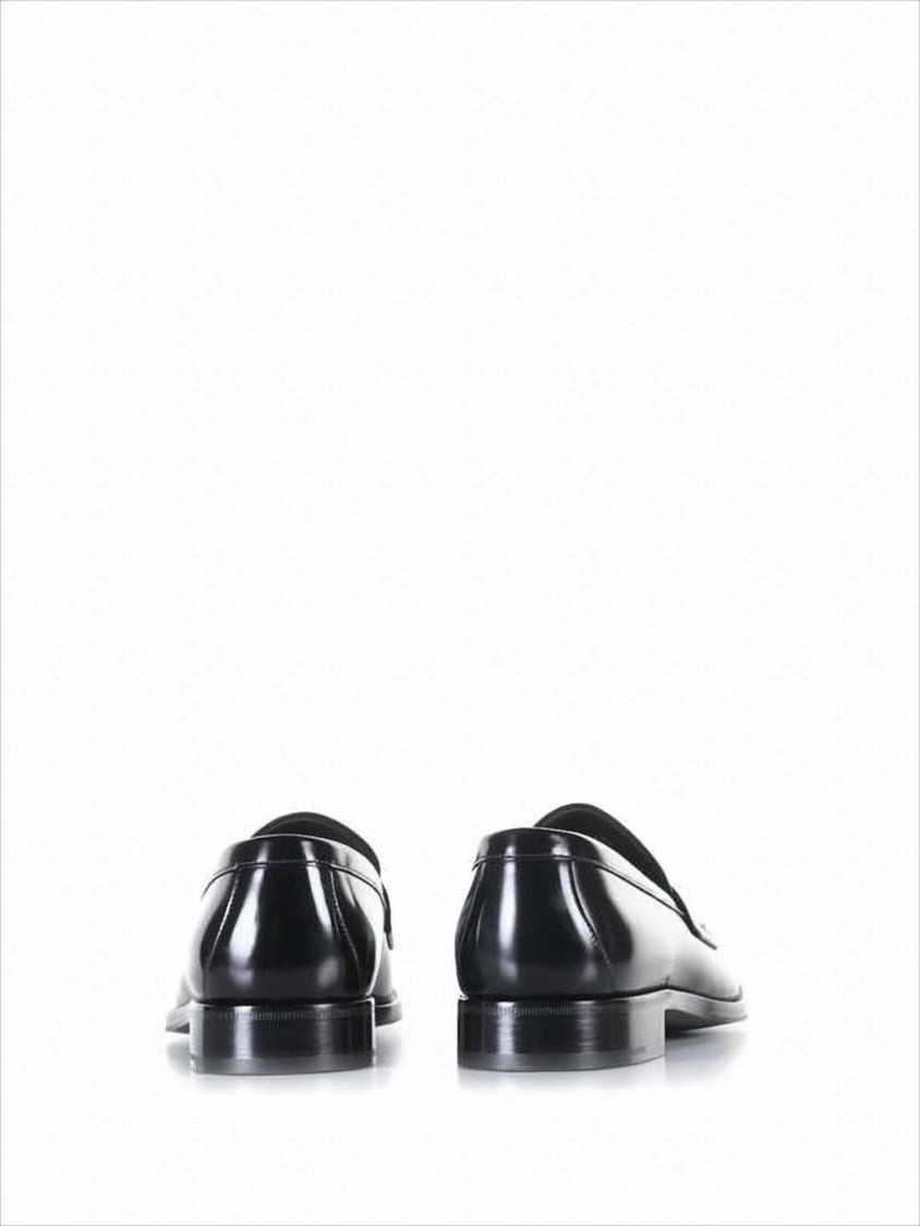 Prada Polished Black Leather Loafers With Minimalist Design