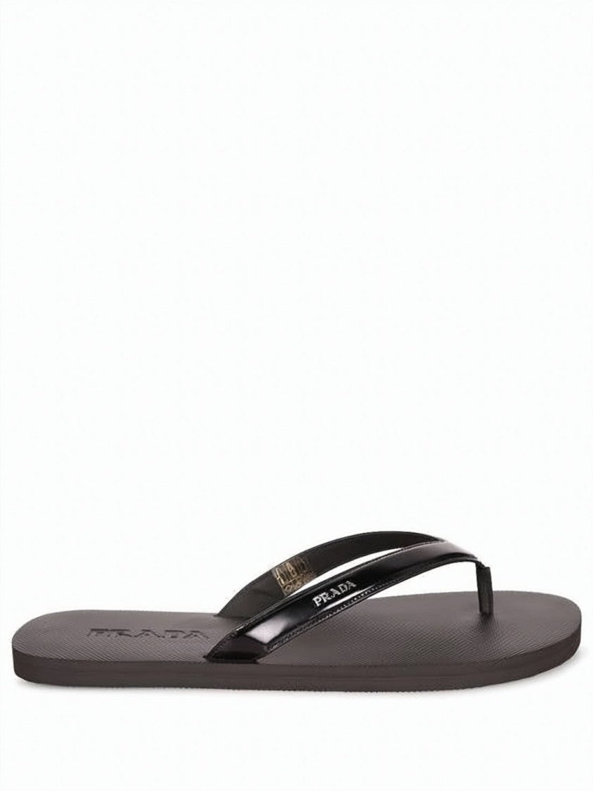 Prada Slip-On Sandals With Textured Footbed And Glossy Strap