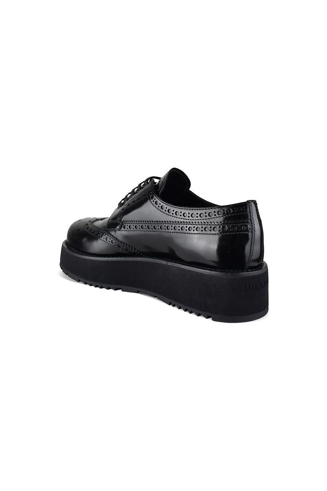 Prada Brogue Derby Shoes In Black Patent Leather