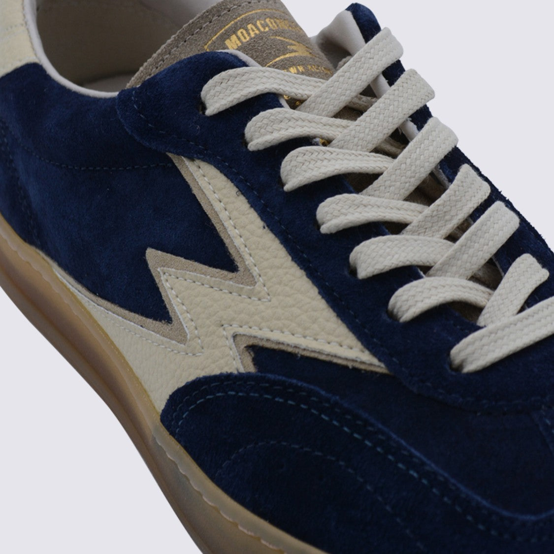 Moaconcept Navy Sneakers From Moaconcept Featuring Round Toe, Laces Fastening, Lateral Logo And Flat Rubber Sole.