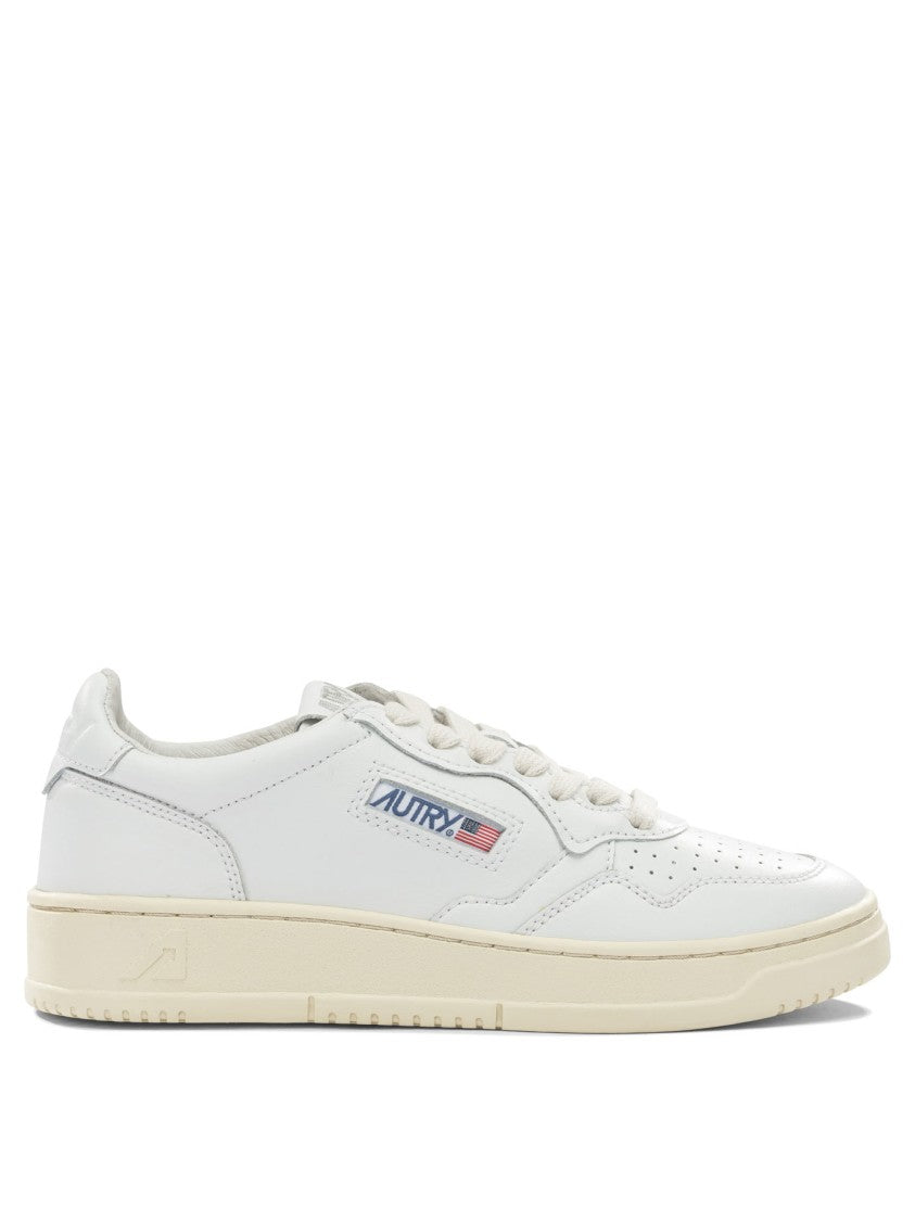 Autry Minimalist Low-Top Sneakers With Perforated Detailing
