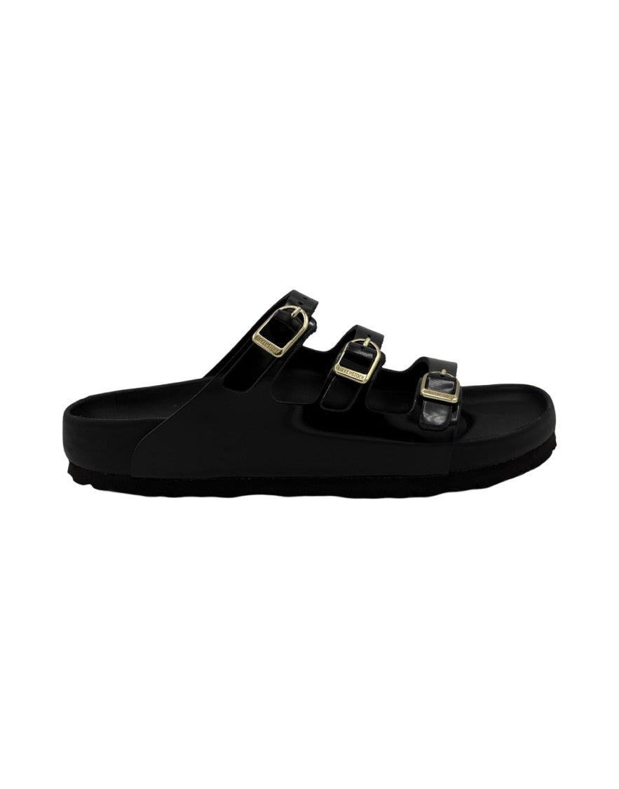 Birkenstock Sleek Black Sandals With Adjustable Straps And Gold Accents