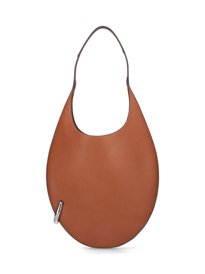 Tory Burch Rounded Minimalist Shoulder Bag With Silver Accent