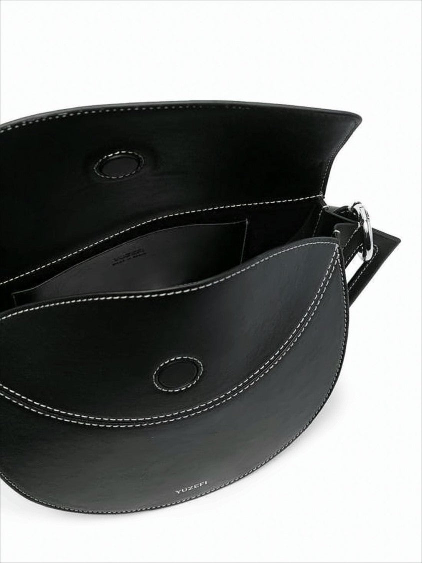 Yuzefi Crescent-Shaped Crossbody Bag With Structured Silhouette
